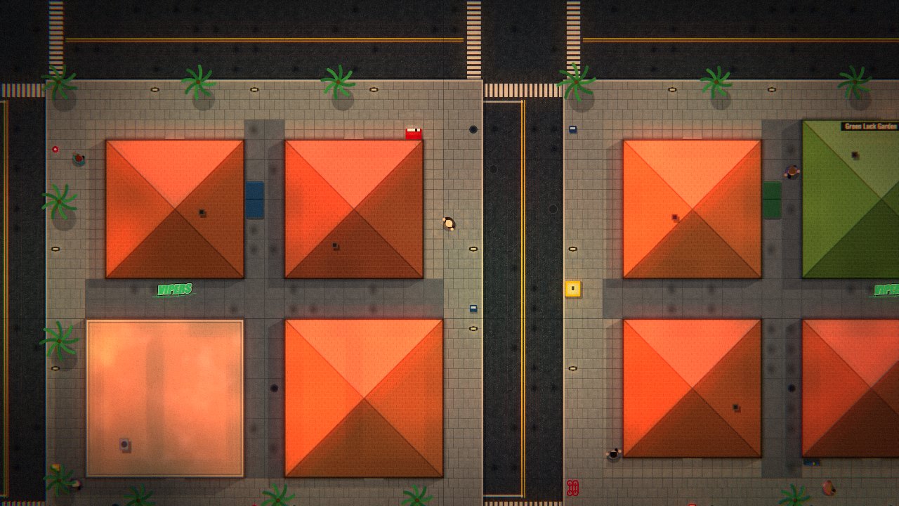 Top-down view of San Aurelio at sunset: terracotta hip roofs, palm-lined pavements and a crossing